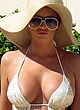 Amy Childs displays her melons in bikini pics