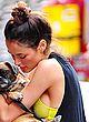 Nicole Trunfio bra peak while petting her dog pics