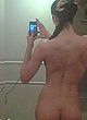Adrianne Curry shooting herself nude in bath pics