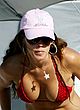 Cristy Rice shows cleavage in red bikini pics