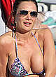 Nicole Minetti shows deep cleavage in bikini pics