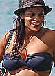 Rosario Dawson sexy on the beach in barbados pics