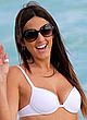 Claudia Romani wearing in bikini on a beach pics