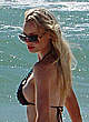 Sophie Turner in black bikini on the beach pics