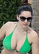 Kelly Brook busty in green bikini poolside pics