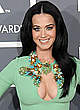 Katy Perry shows cleavage in green dress pics