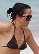 Andrea Corr sunbathes in bikini on a beach pics