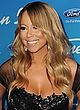 Mariah Carey busty in a low cut mini dress pics
