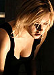 Elisha Cuthbert naked pics - exposes her ass in a thong