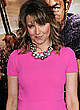 Lucy Lawless in pink dress at premiere pics