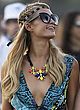 Paris Hilton braless & cleavy in mini dress pics