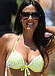 Claudia Romani shows cleavage in bikini pics
