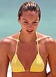 Candice Swanepoel shows butts in thong bikini pics