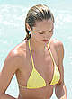Candice Swanepoel in yellow bikini on the beach pics