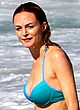 Heather Graham wearing blue bikini on a beach pics