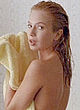 Traci Lords naked pics - toweling off after shower