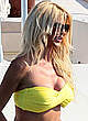 Victoria Silvstedt in yellow bikini on a yacht pics