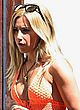 Ashley Tisdale busty in tiny orange monokini pics