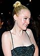 Dakota Fanning shows cleavage & milky belly pics