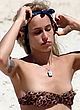 Alice Dellal bikini nip slip on a beach pics