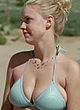 Kelli Garner busty cleavage in blue bikini pics