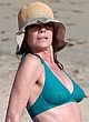 Marg Helgenberger wearing a turquoise bikini pics