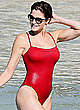 Stephanie Seymour sexy in red tight swimsuit pics