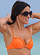 Claudia Romani in red and orange bikinies pics