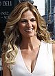 Erin Andrews busty in a low cut white dress pics