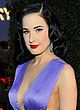 Dita Von Teese cleavy & showing side-boob pics