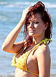 Caitlin O'Connor wearing skimpy yellow bikini pics