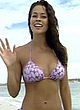Brooke Burke sexy purple bikini on beach pics