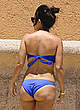 Kourtney Kardashian wearing a bikini at a pool pics