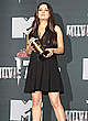 Mila Kunis shows legs at awards ceremony pics
