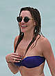 Katie Cassidy wearing a bikini at a beach pics