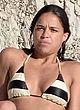 Michelle Rodriguez busty in a tiny striped bikini pics