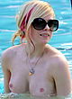 Avril Lavigne caught naked at the pool pics