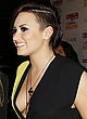 Demi Lovato shows huge cleavage & leggy pics