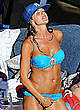 Danielle Lloyd in blue bikini poolside shots pics