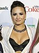 Demi Lovato busty in a black leather bra pics