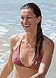 Gisele Bundchen wearing a bikini on the beach pics