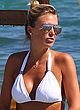 Alex Gerrard wears white bikini at a beach pics