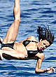 Michelle Rodriguez in black bikini on a boat pics