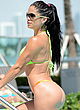 Michelle Lewin shows ass in thong two-pieces pics