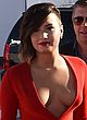 Demi Lovato braless in red revealing dress pics