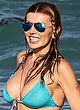 Rita Rusic busty in a skimpy blue bikini pics