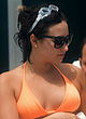 Demi Lovato busty in orange two-piece pics