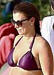 Coleen Rooney busty in skimpy purple bikini pics