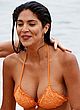 Pia Miller busty in an orange bikini pics