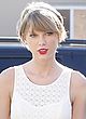 Taylor Swift leggy in tiny white mini dress pics